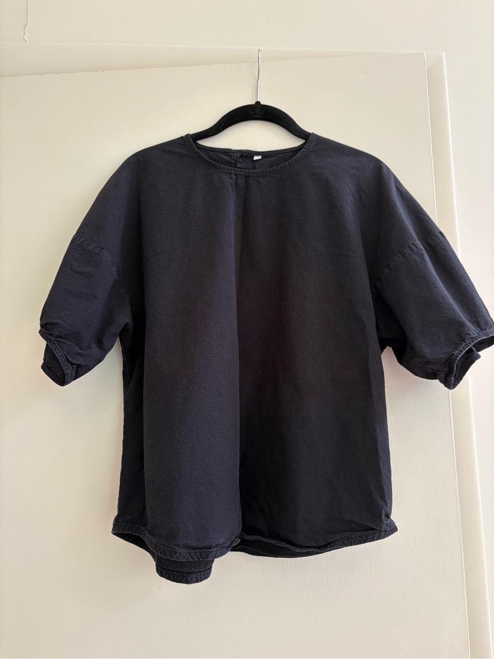 Black collarless shirt by Muji